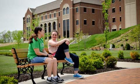 Students sitting in Raven Memorial Park